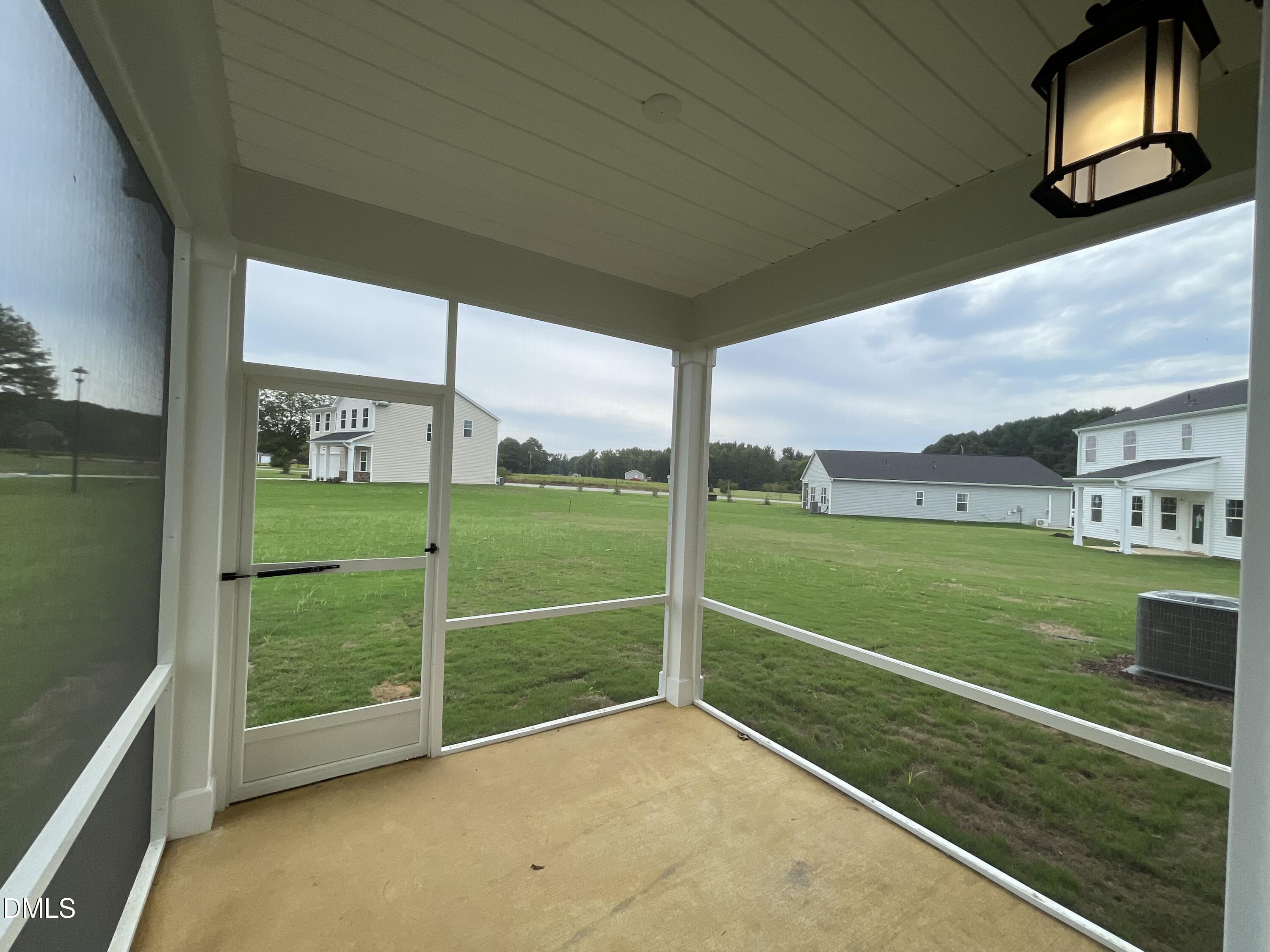 66 Digging Time Avenue Princeton, NC 27569 - Photo 20 of 47 a view of a house with backyard
