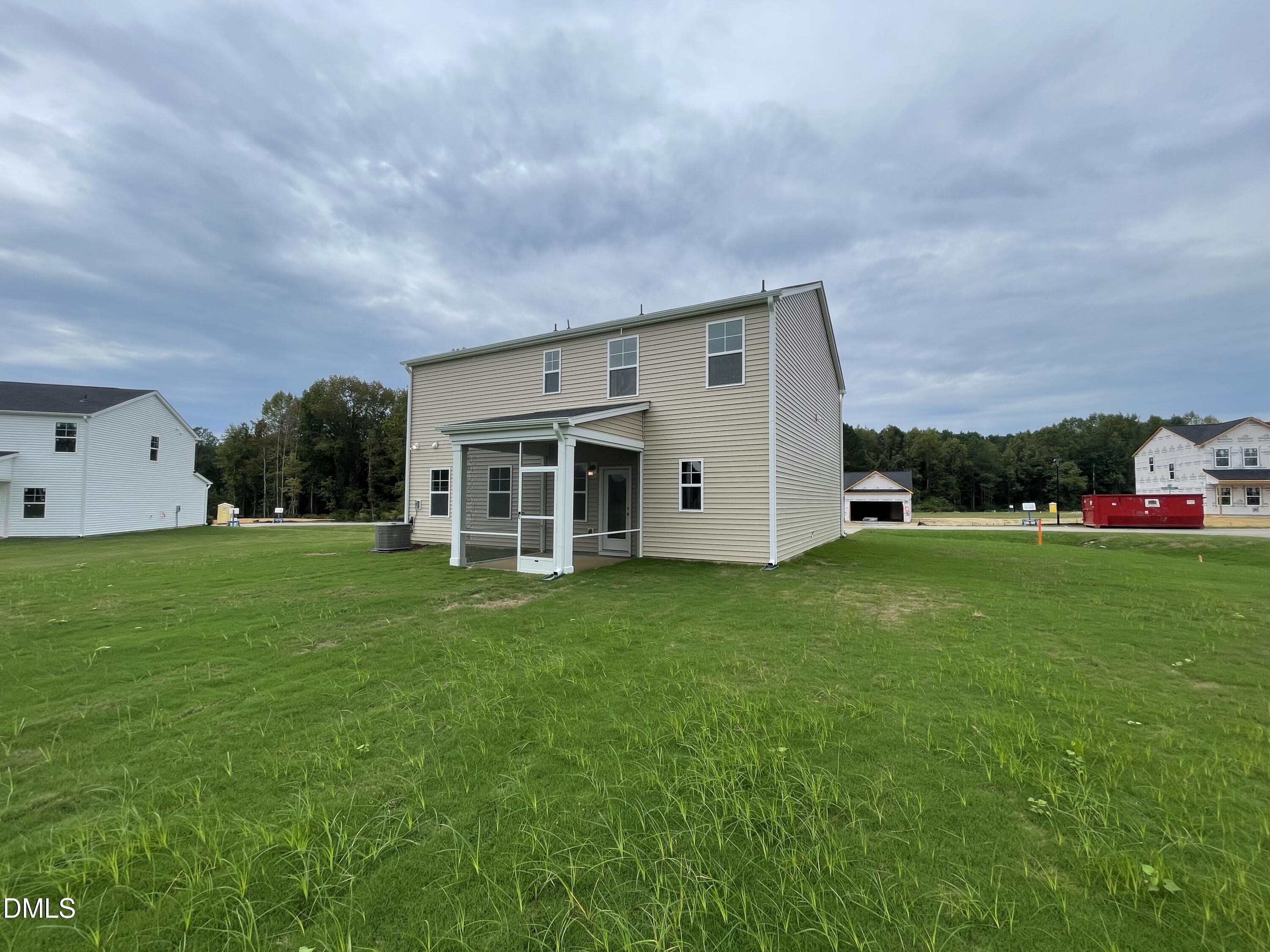 66 Digging Time Avenue Princeton, NC 27569 - Photo 21 of 47 a view of a house with backyard