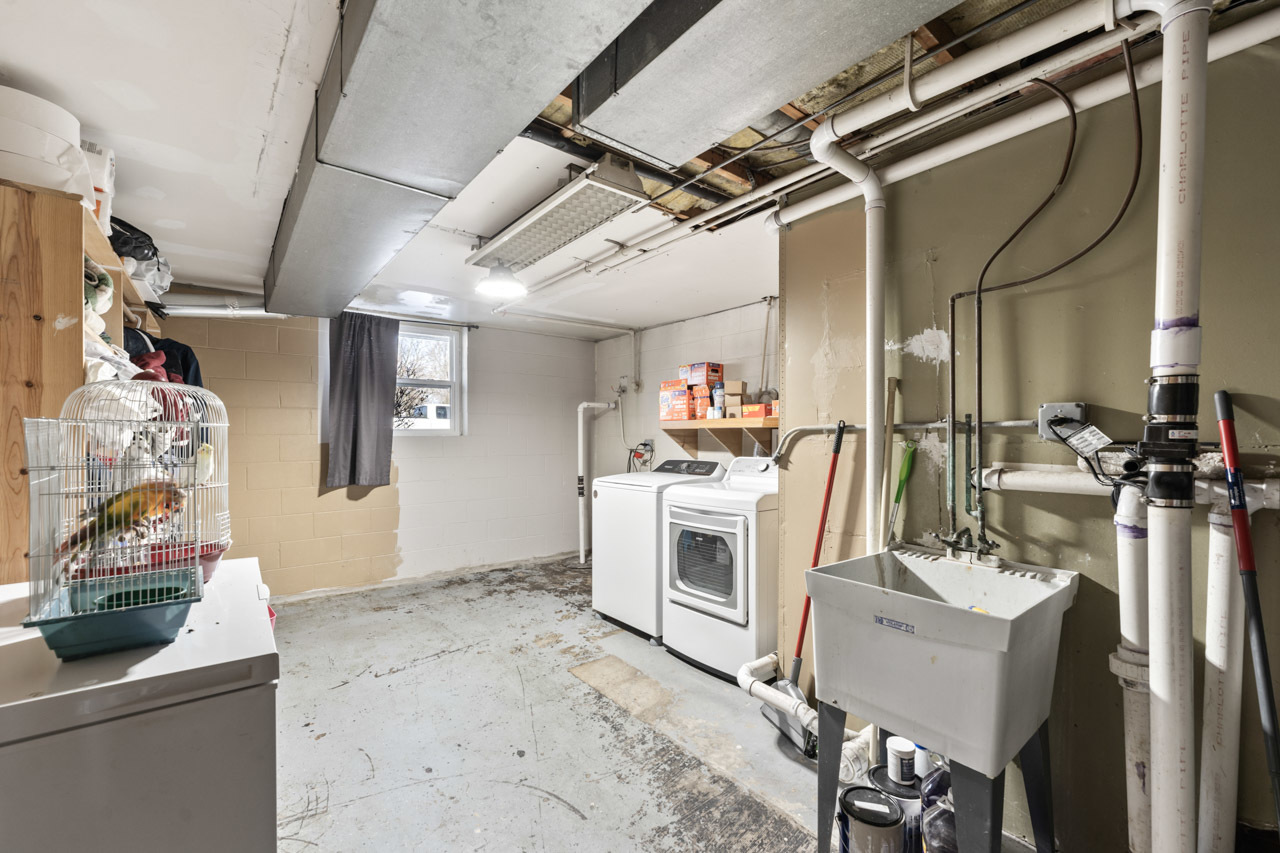 727 Lacy Avenue Streamwood, IL 60107 - Photo 27 of 30 a room with storage and utility