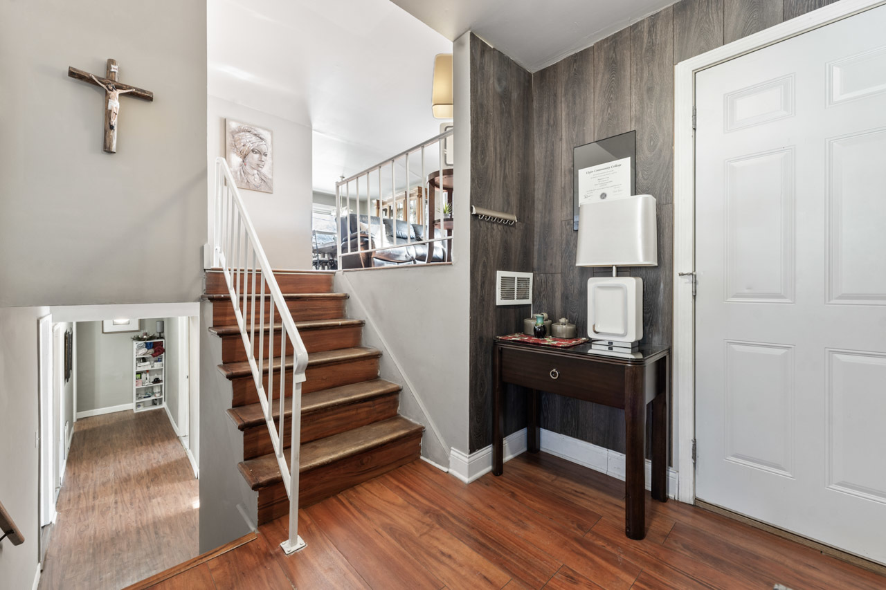 727 Lacy Avenue Streamwood, IL 60107 - Photo 4 of 30 a view of entryway and hall with wooden floor