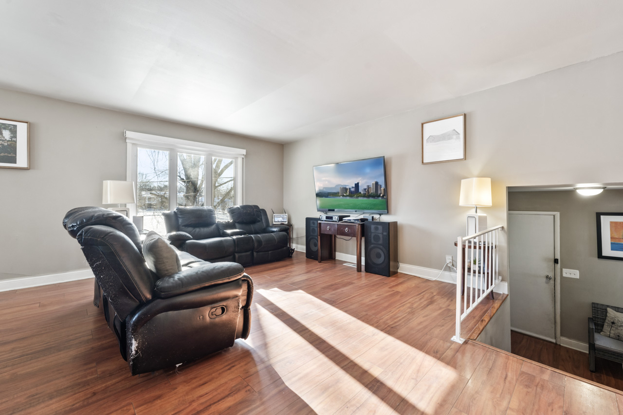 727 Lacy Avenue Streamwood, IL 60107 - Photo 5 of 30 a living room with furniture and a wooden floor
