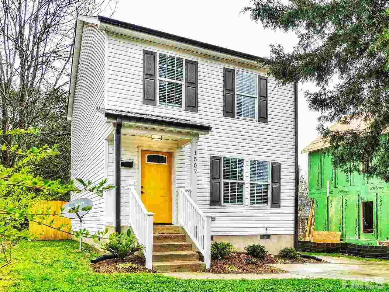 1507 Pender Street Raleigh, NC 27610 - Photo 1 of 30 a front view of a house with a yard