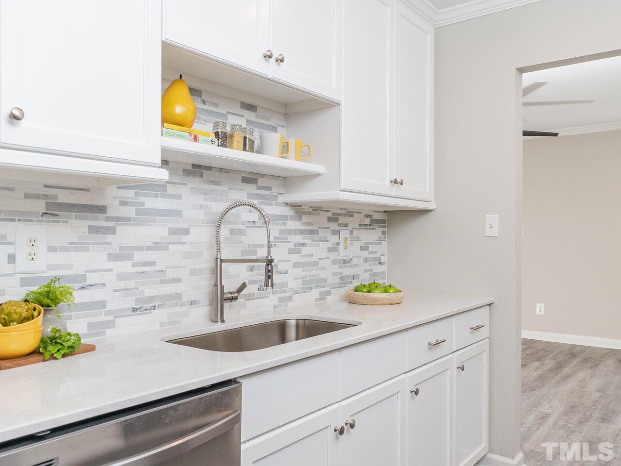1507 Pender Street Raleigh, NC 27610 - Photo 15 of 30 a close view of sink and tap