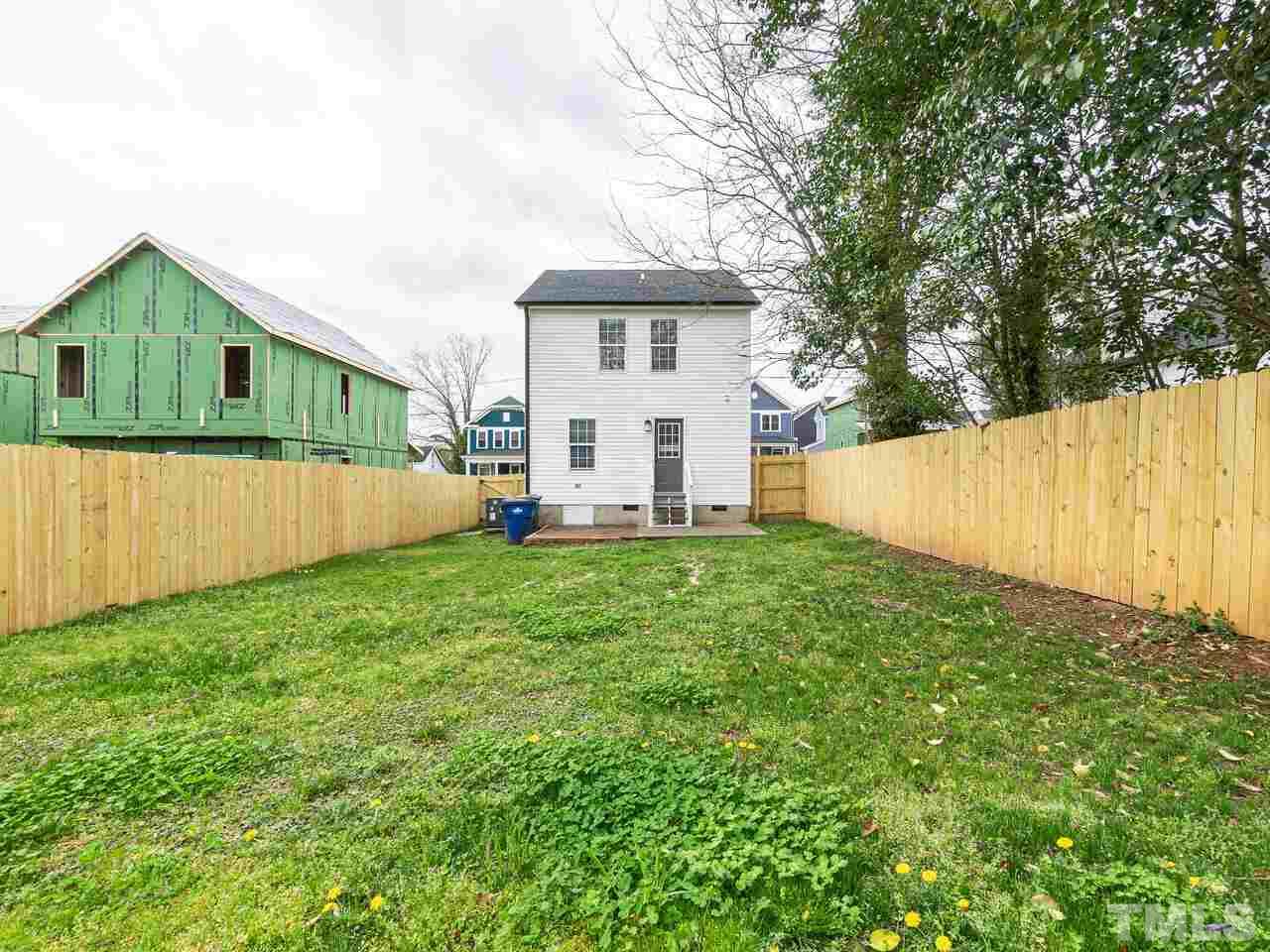 1507 Pender Street Raleigh, NC 27610 - Photo 23 of 30 a view of a house with backyard and garden