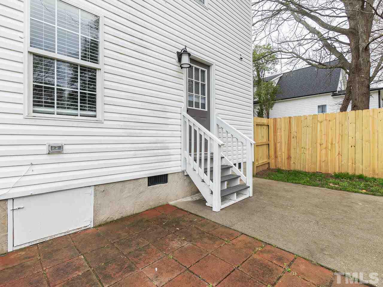 1507 Pender Street Raleigh, NC 27610 - Photo 25 of 30 a view of a house with a yard