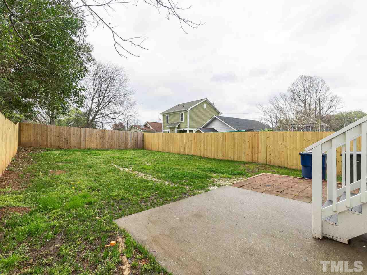 1507 Pender Street Raleigh, NC 27610 - Photo 26 of 30 a view of backyard with green space