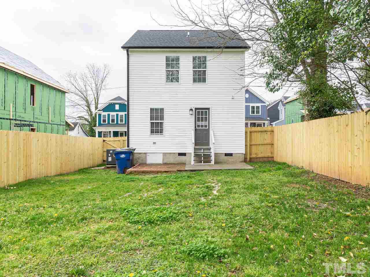 1507 Pender Street Raleigh, NC 27610 - Photo 27 of 30 a view of backyard with house and garden