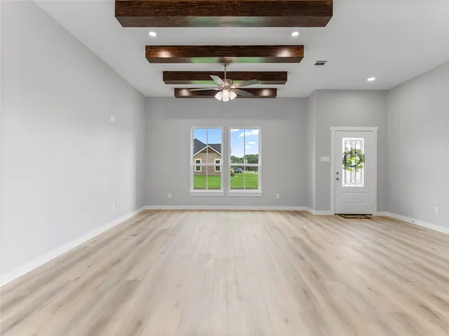 an empty room with windows