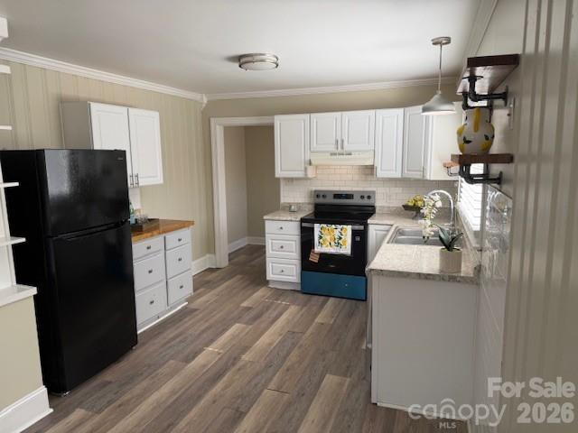 614 North Rhyne Street Gastonia, NC 28054 - Photo 11 of 29 a kitchen with stainless steel appliances a refrigerator stove and wooden floor
