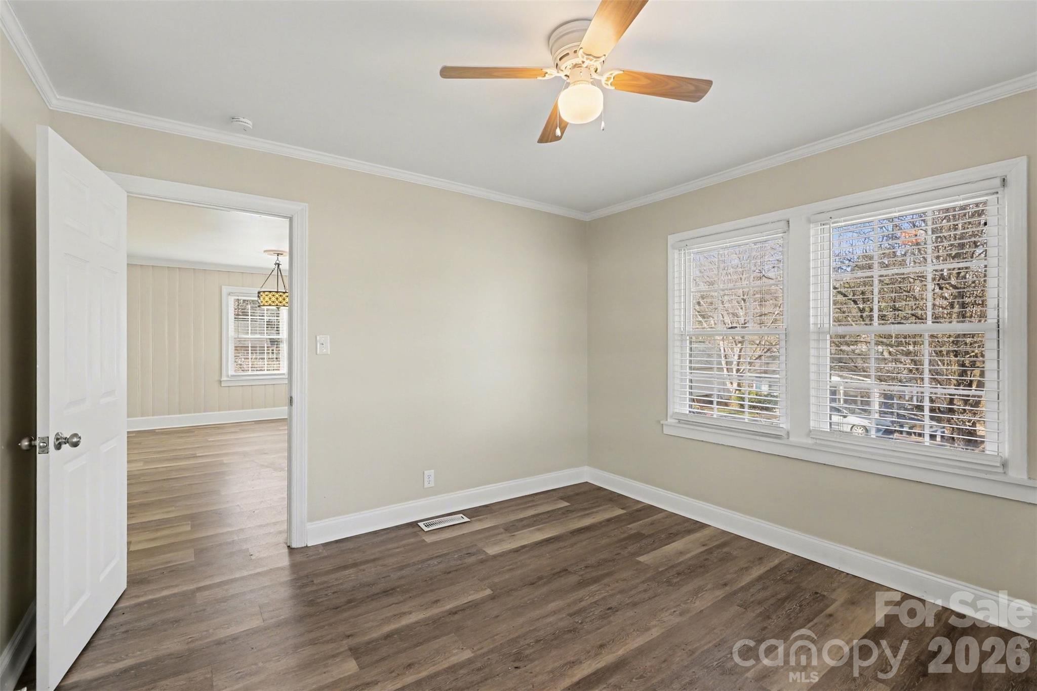 614 North Rhyne Street Gastonia, NC 28054 - Photo 19 of 29 wooden floor in an empty room with a window