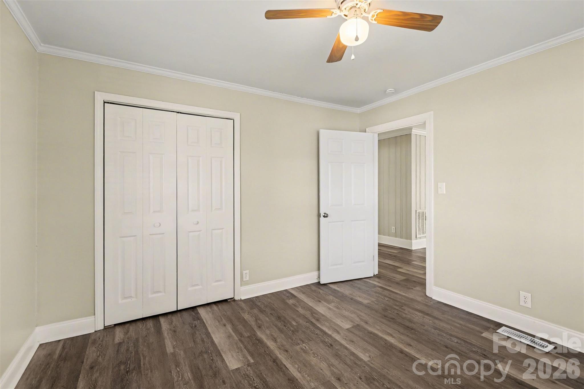 614 North Rhyne Street Gastonia, NC 28054 - Photo 20 of 29 a view of an empty room with wooden floor