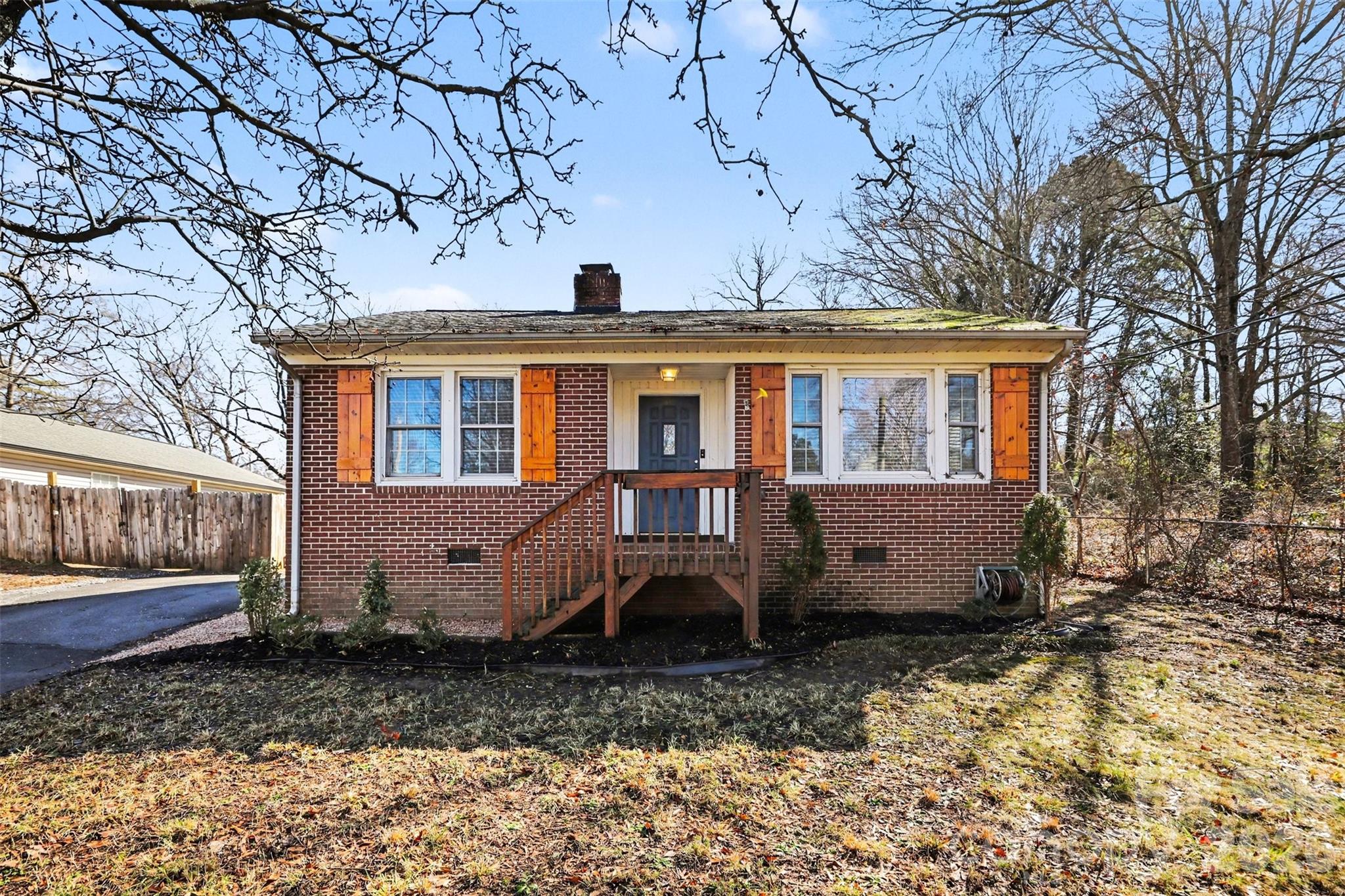 614 North Rhyne Street Gastonia, NC 28054 - Photo 2 of 29 a view of a house with a yard and large tree