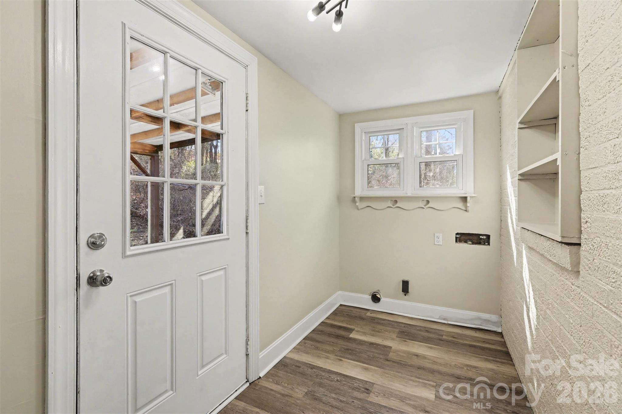 614 North Rhyne Street Gastonia, NC 28054 - Photo 23 of 29 a view of a hallway with wooden floor and entryway