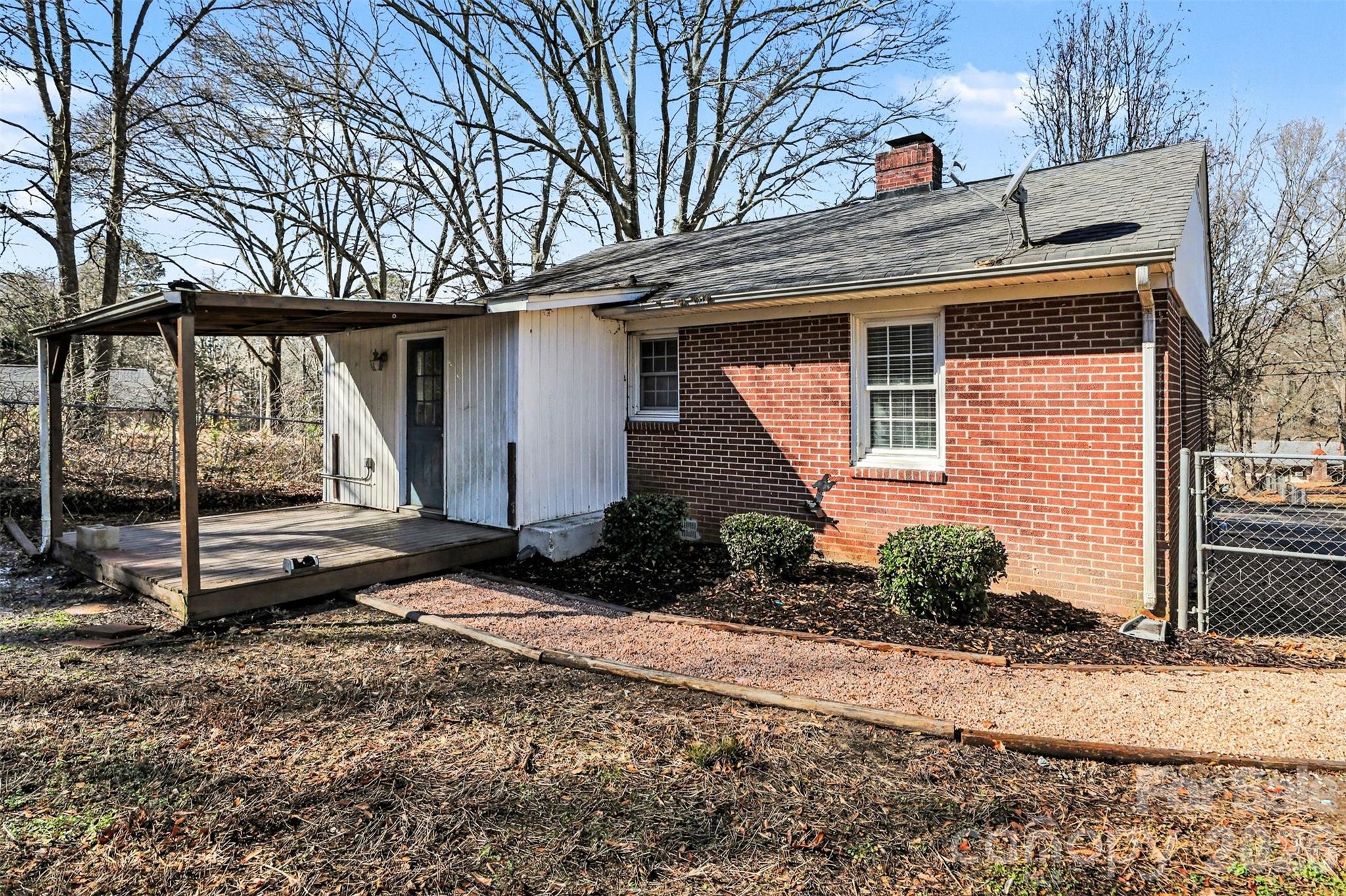 614 North Rhyne Street Gastonia, NC 28054 - Photo 25 of 29 a view of a house with a yard