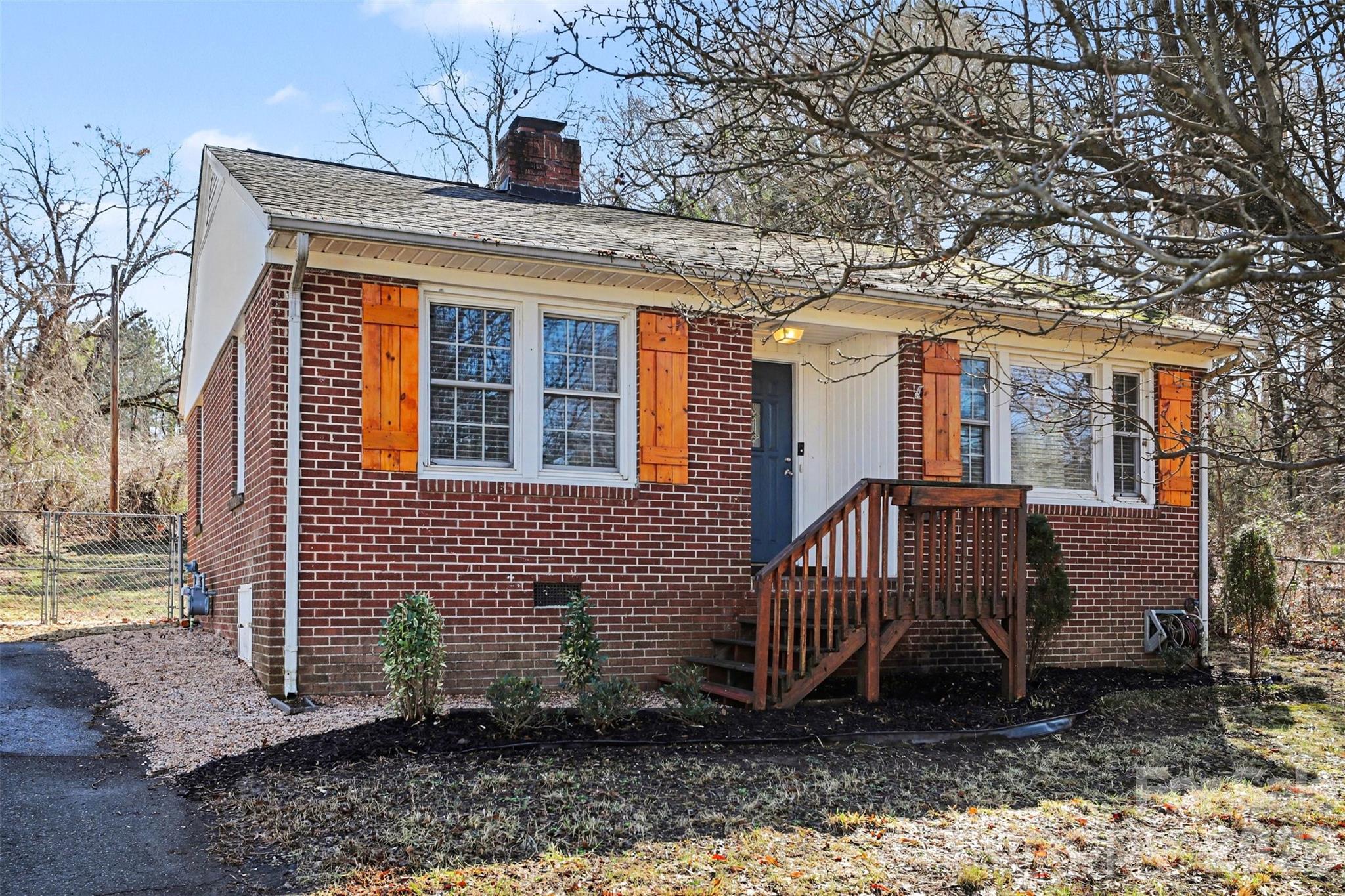 614 North Rhyne Street Gastonia, NC 28054 - Photo 3 of 29 a front view of a house with a yard