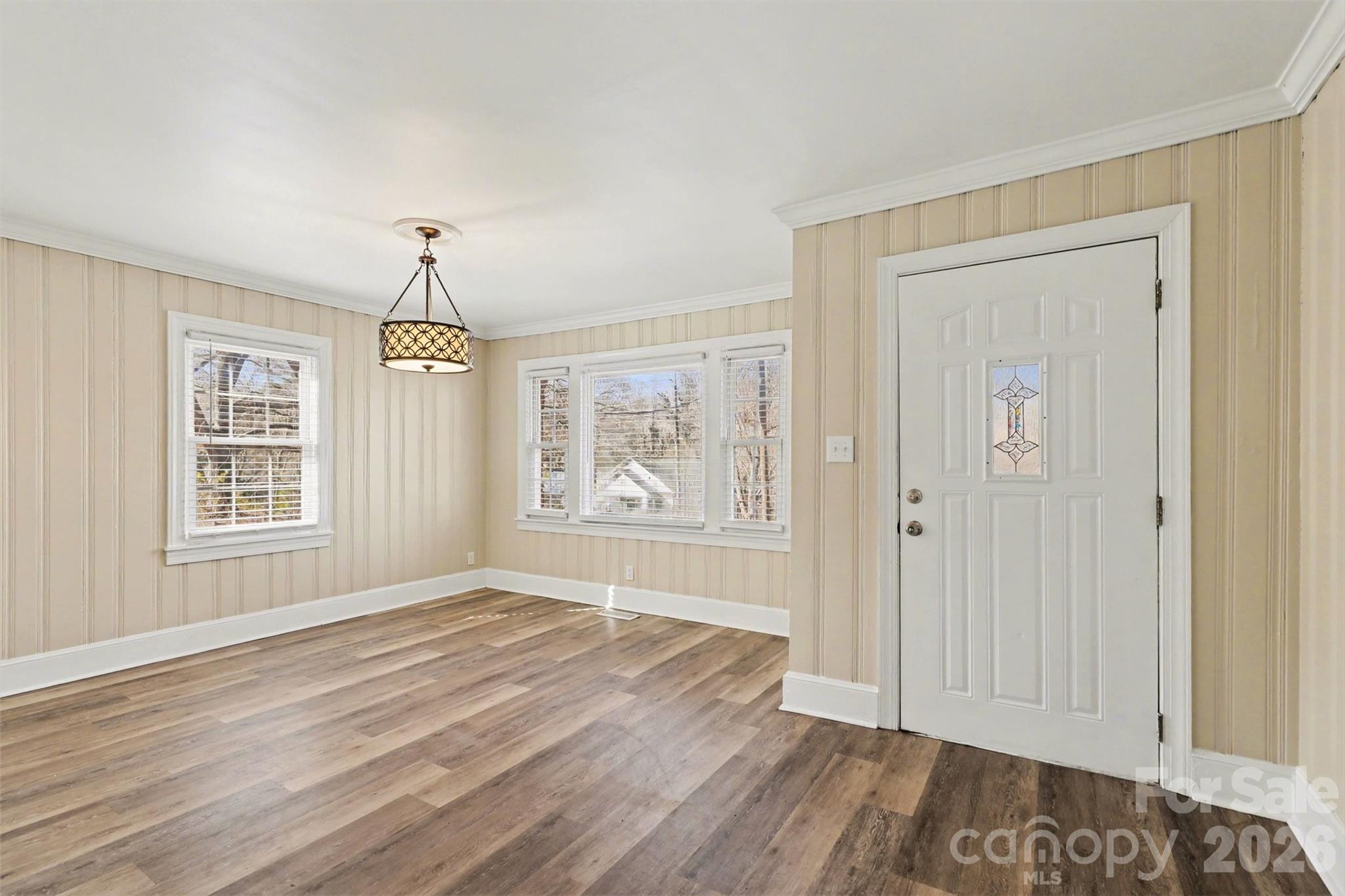 614 North Rhyne Street Gastonia, NC 28054 - Photo 4 of 29 wooden floor in an empty room with a window