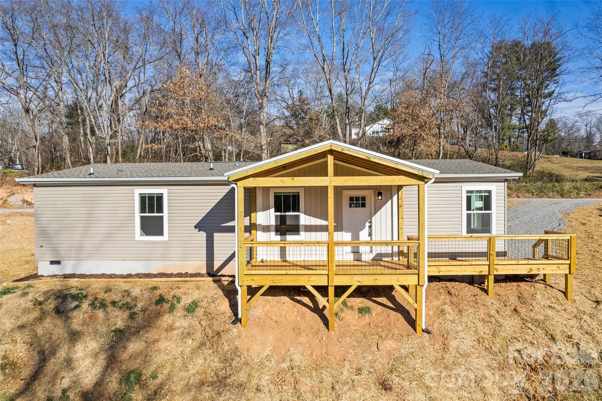 77 Geiranger Drive Clyde, NC 28721 - Photo 1 of 29 a house view with a outdoor space