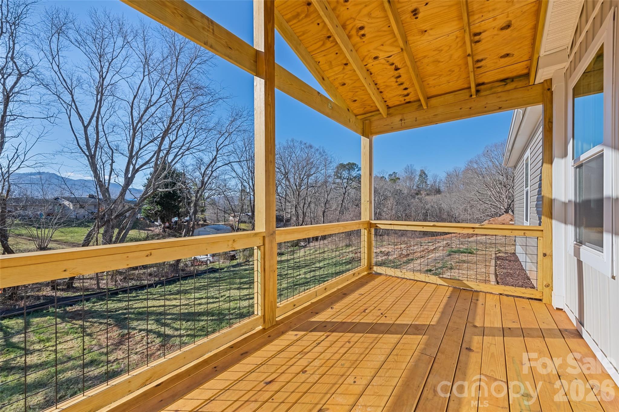 77 Geiranger Drive Clyde, NC 28721 - Photo 3 of 29 a view of a swimming pool with a patio