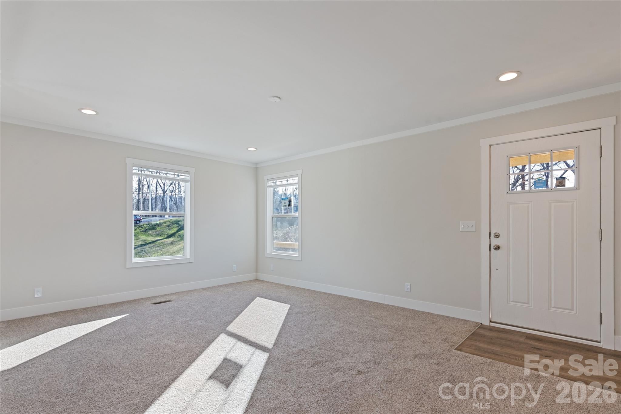 77 Geiranger Drive Clyde, NC 28721 - Photo 6 of 29 a view of an empty room with a window