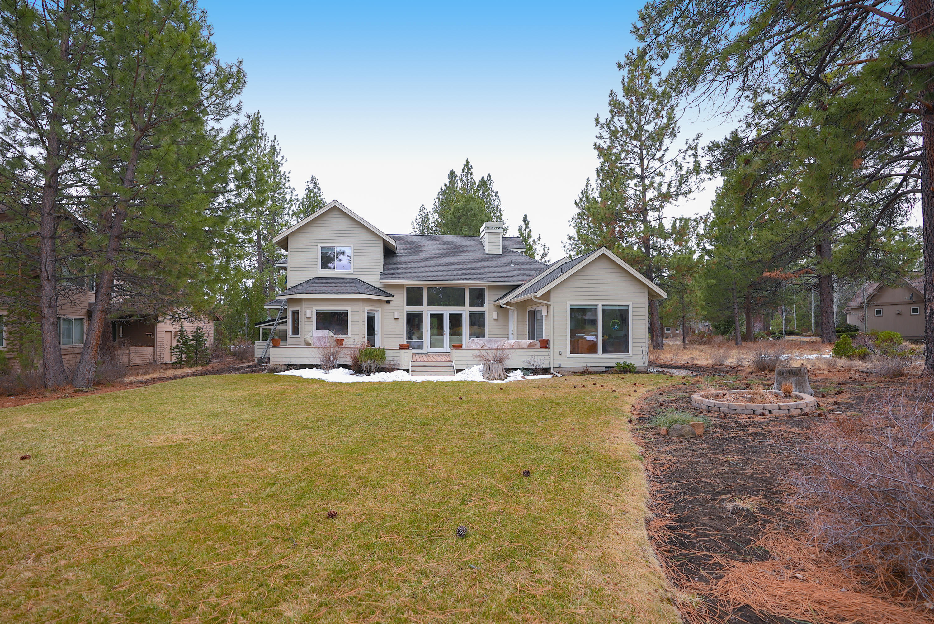 60709 Golf Village Loop Bend, OR 97702 - Photo 4 of 45 Rear view of home from pond