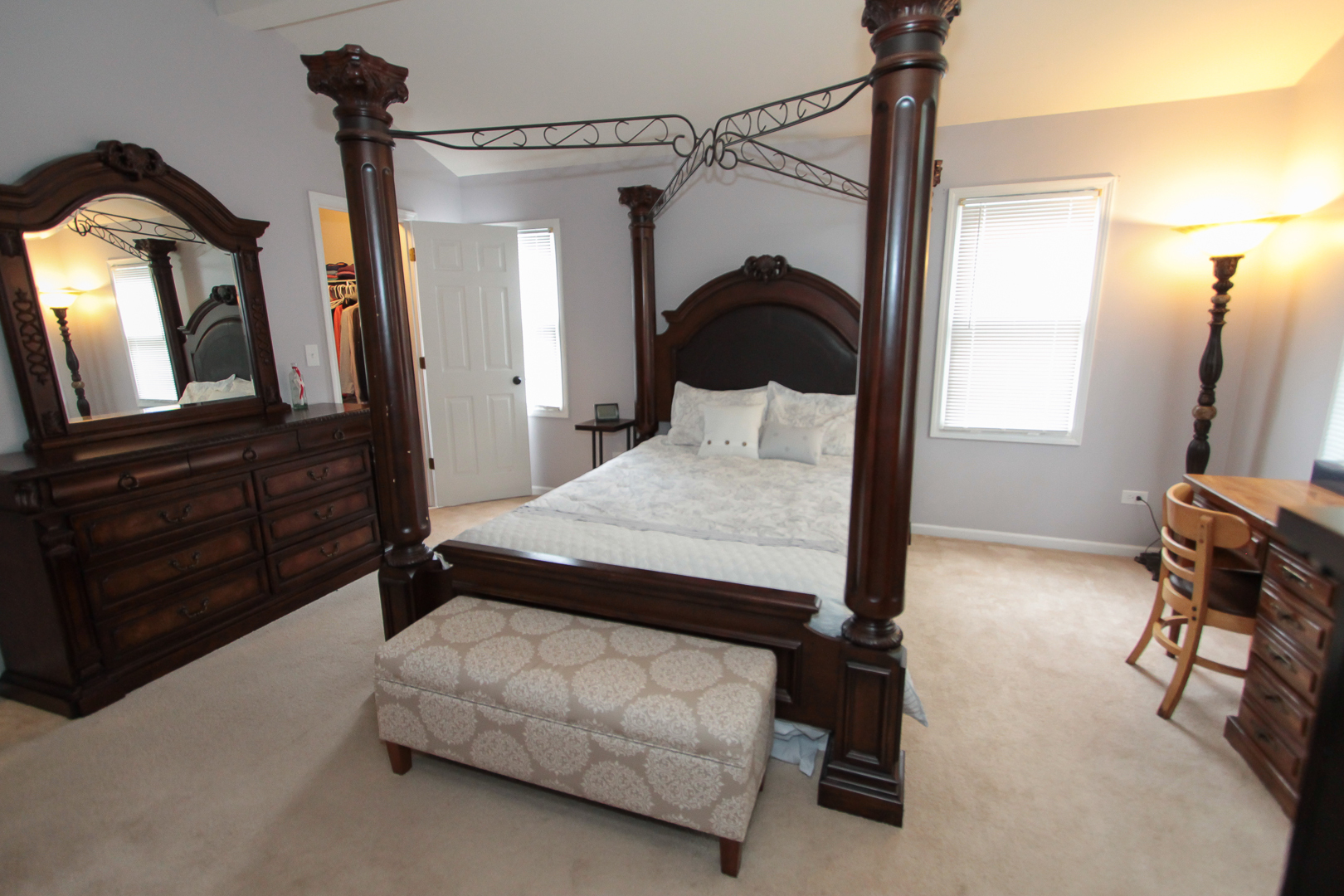 1474 Knotty Pine Drive Elgin, IL 60123 - Photo 11 of 21 a bedroom with a bed a mirror and dresser