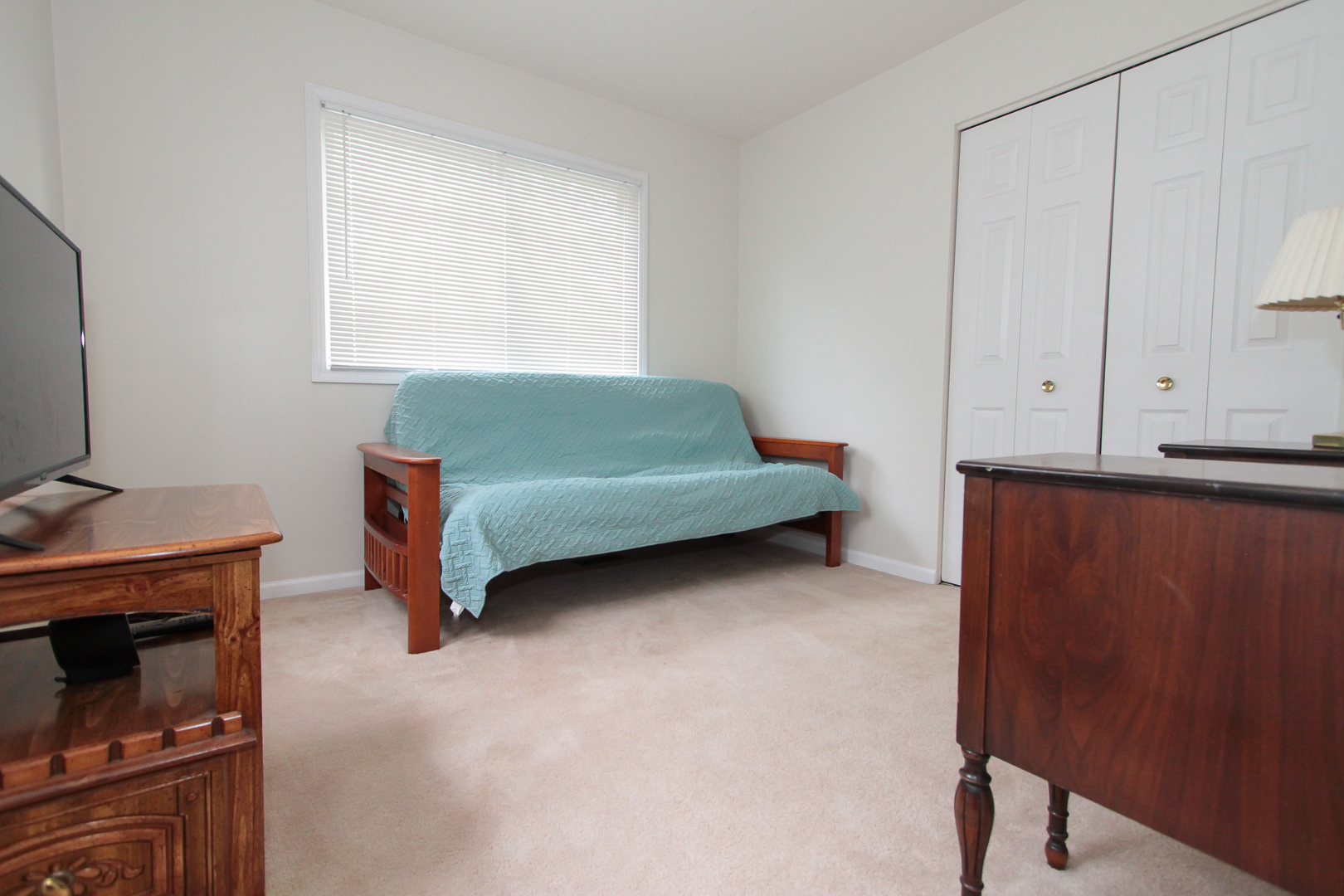 1474 Knotty Pine Drive Elgin, IL 60123 - Photo 15 of 21 a bedroom with a bed and a fireplace