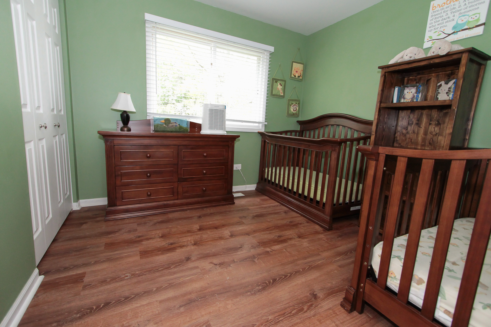 1474 Knotty Pine Drive Elgin, IL 60123 - Photo 16 of 21 a room with a bed and a window