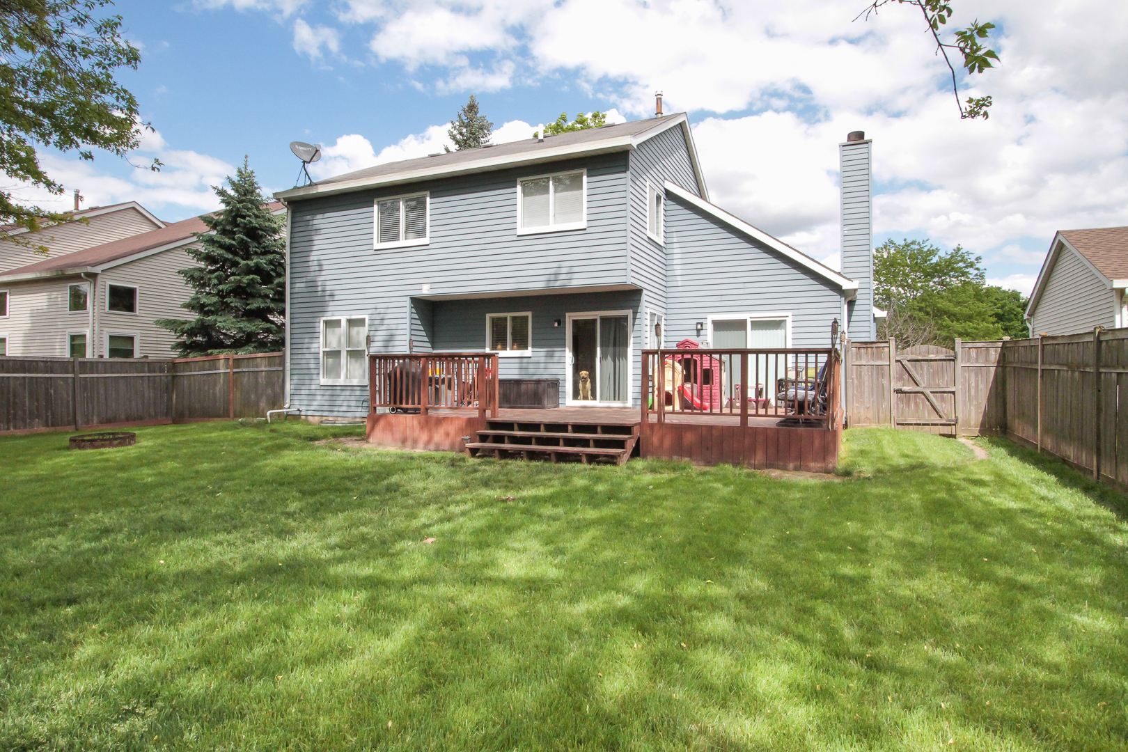 1474 Knotty Pine Drive Elgin, IL 60123 - Photo 21 of 21 a view of a house with a yard and sitting area