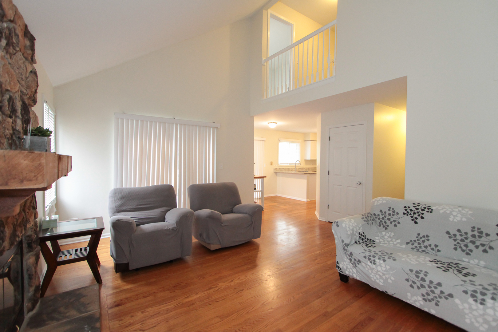 1474 Knotty Pine Drive Elgin, IL 60123 - Photo 9 of 21 a living room with furniture and a wooden floor