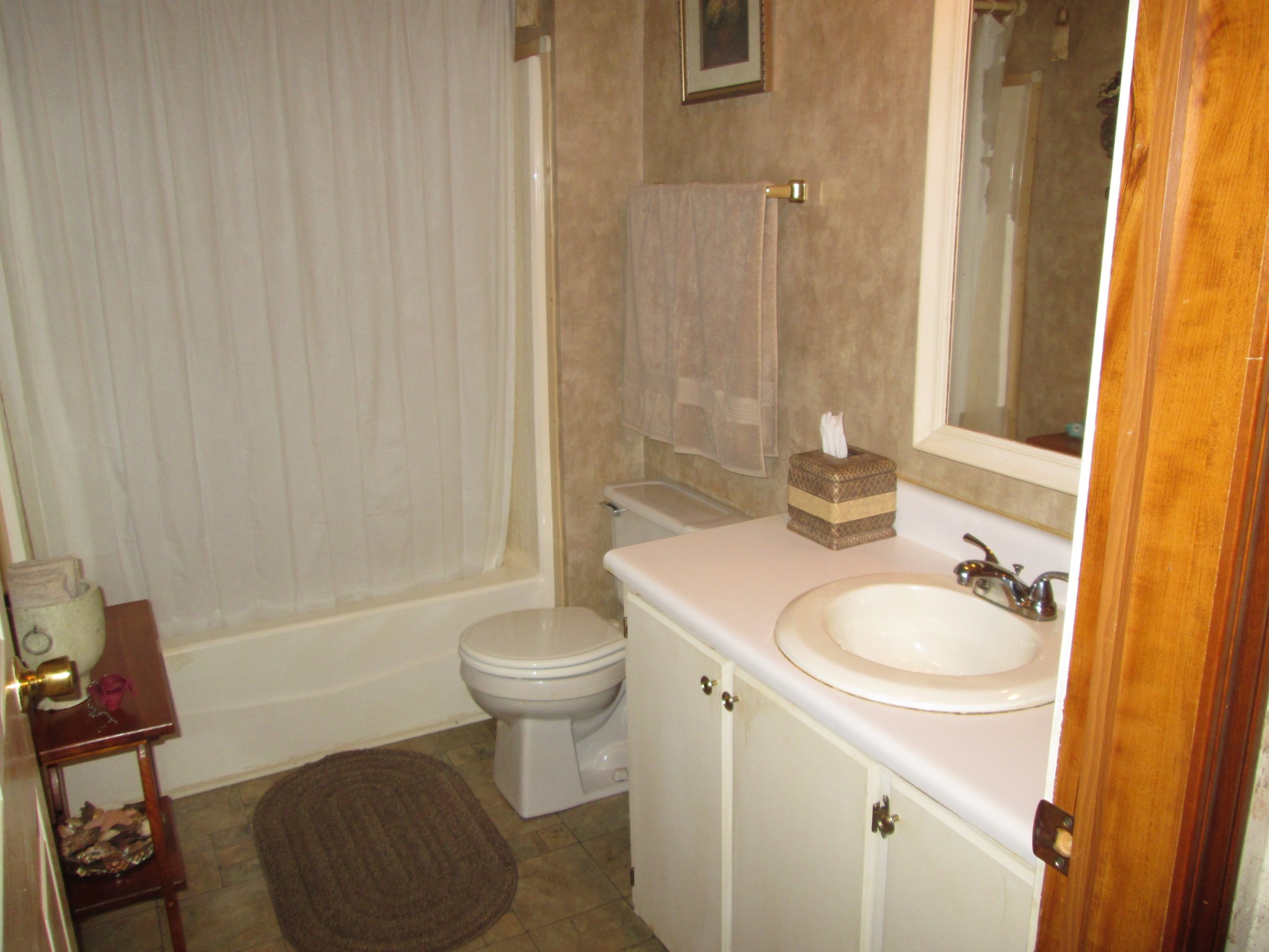 2300 Callis Road Lebanon, TN 37090 - Photo 14 of 21 a bathroom with a sink toilet and shower