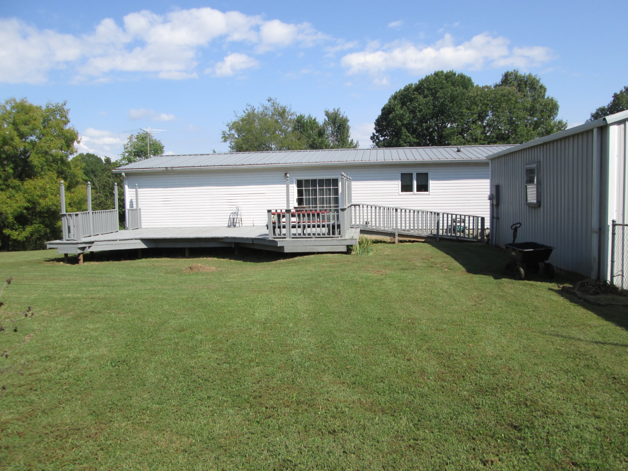 2300 Callis Road Lebanon, TN 37090 - Photo 2 of 21 a front view of a house with a garden and yard