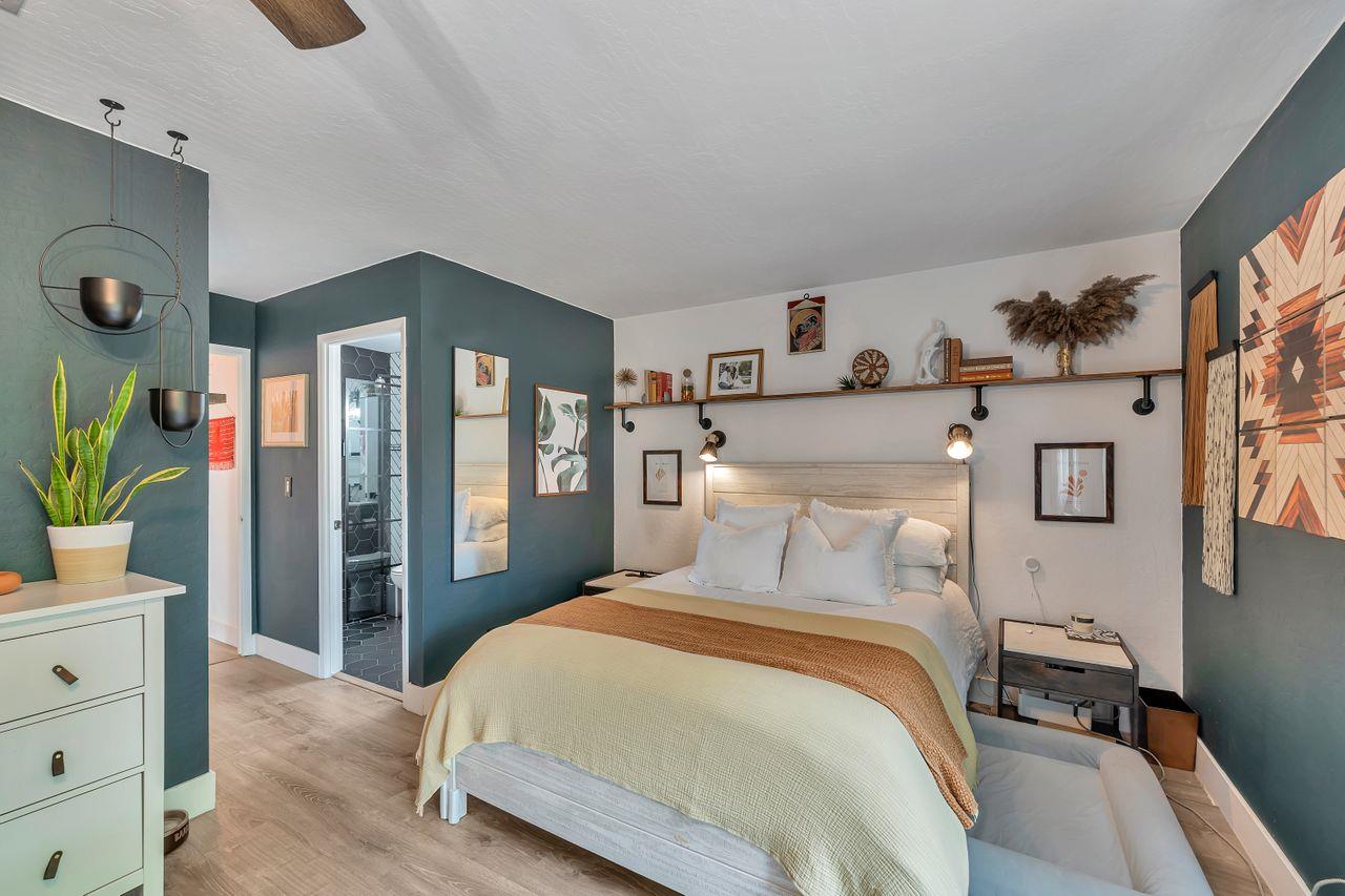 470 Corte Cabanil Morgan Hill, CA 95037 - Photo 26 of 41 a bedroom with a bed and a potted plant