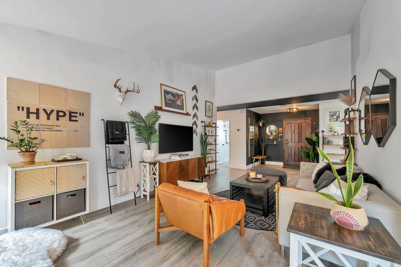 470 Corte Cabanil Morgan Hill, CA 95037 - Photo 10 of 41 a living room with furniture a flat screen tv and kitchen view