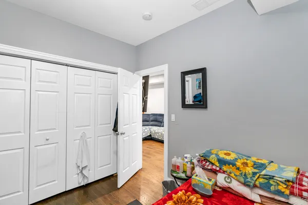 a hallway with toys and wooden floor
