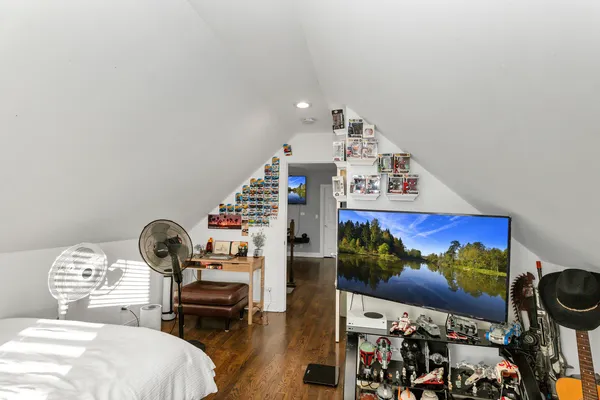 a room with furniture and a wooden floor