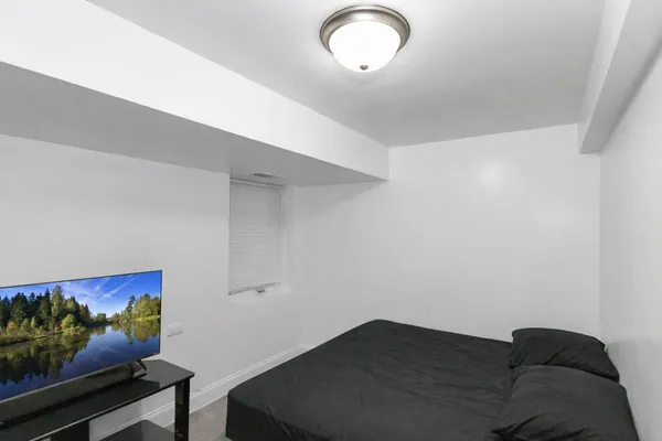 a view of a livingroom with wooden floor
