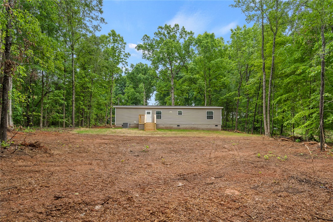 419 Austin Drive Anderson, SC 29624 - Photo 34 of 36 This newly constructed home sits on a spacious cleared lot, surrounded by a natural wooded landscape.