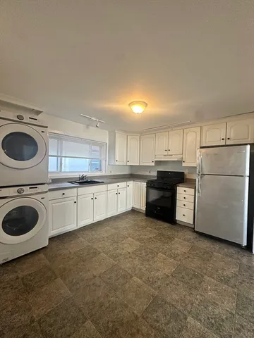 a view of a kitchen with electric equipment