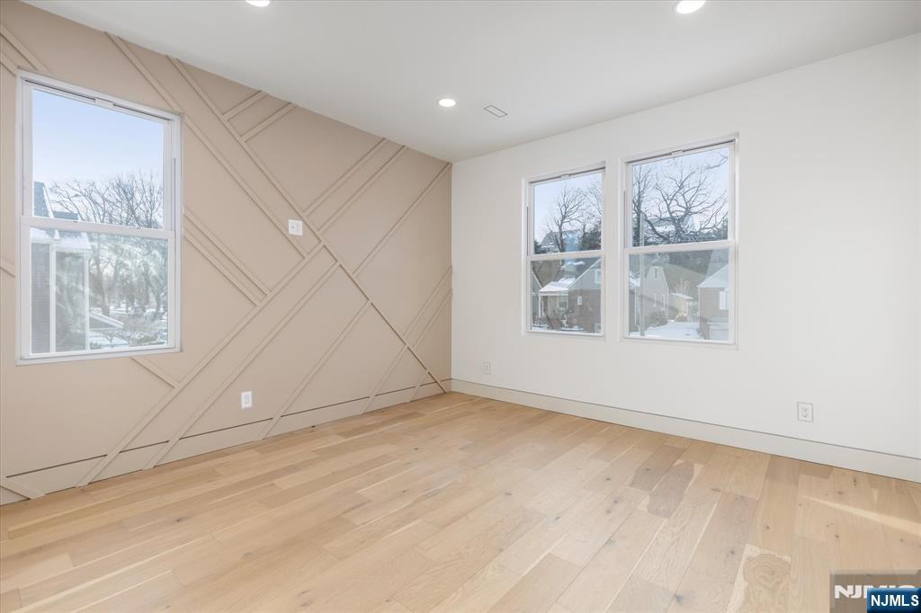 33 Elycroft Parkway Rutherford, NJ 07070 - Photo 18 of 46 a view of an empty room with a window