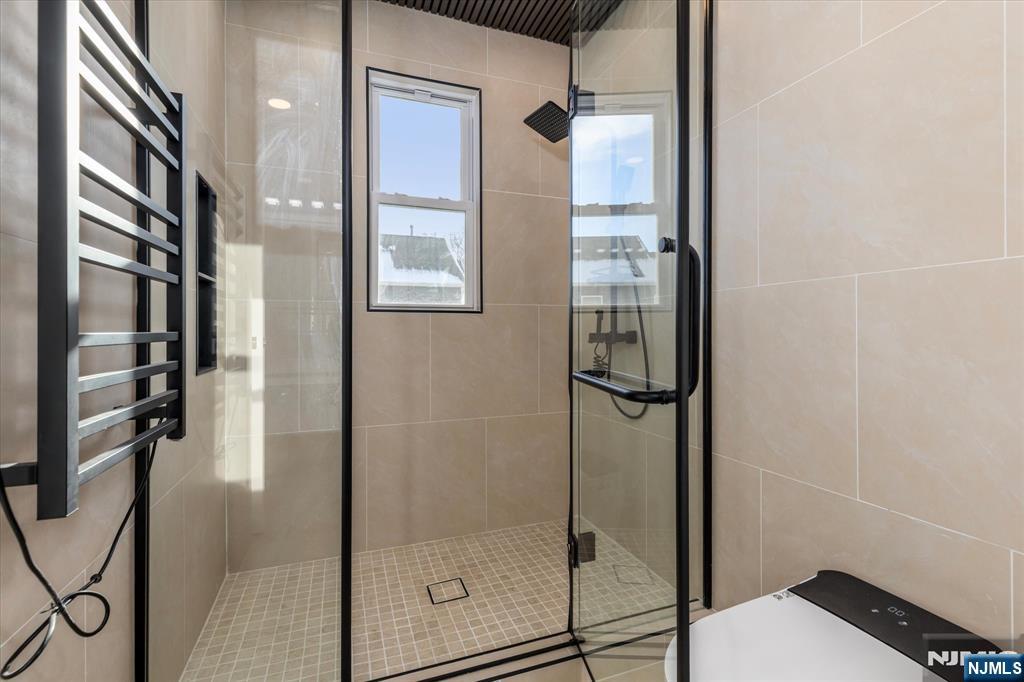 33 Elycroft Parkway Rutherford, NJ 07070 - Photo 20 of 46 a bathroom with a shower