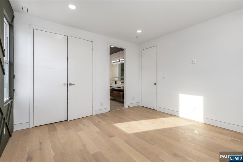 33 Elycroft Parkway Rutherford, NJ 07070 - Photo 23 of 46 an empty room with a natural light