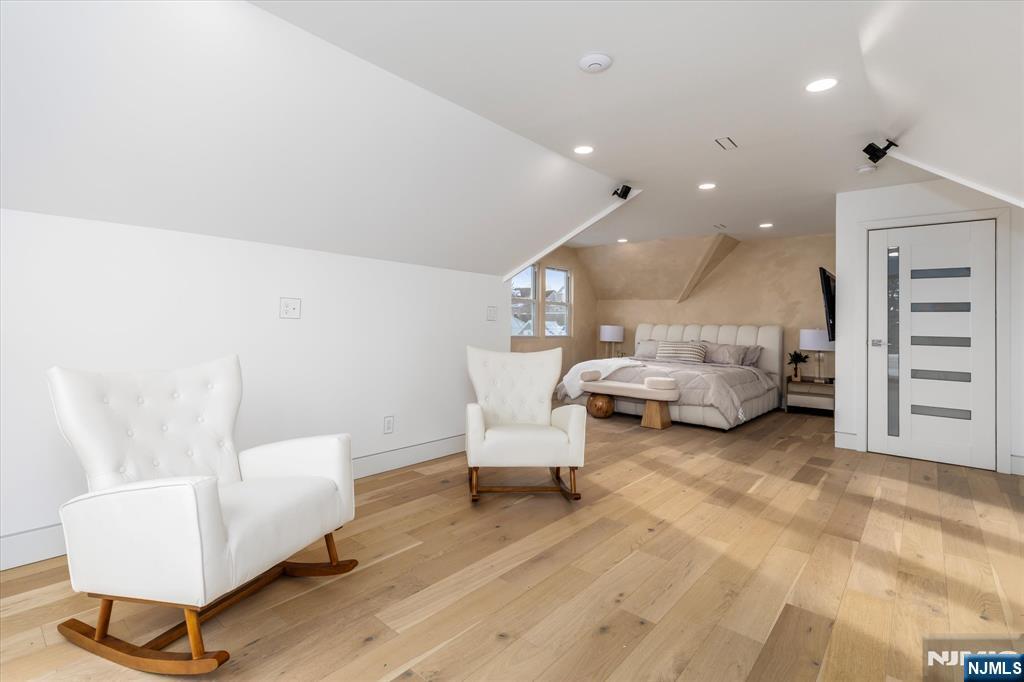 33 Elycroft Parkway Rutherford, NJ 07070 - Photo 31 of 46 a living room with furniture and a couch