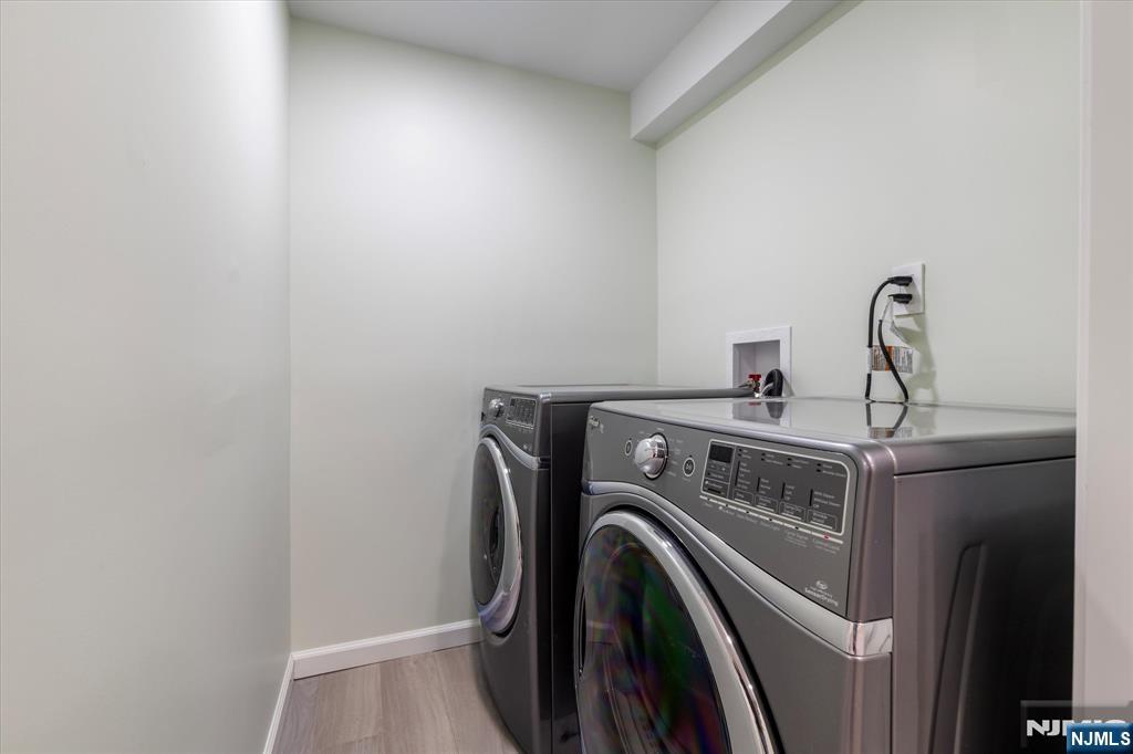 33 Elycroft Parkway Rutherford, NJ 07070 - Photo 41 of 46 a view of storage and utility room with washer and dryer