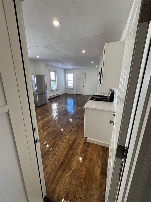 a view of a kitchen from a window