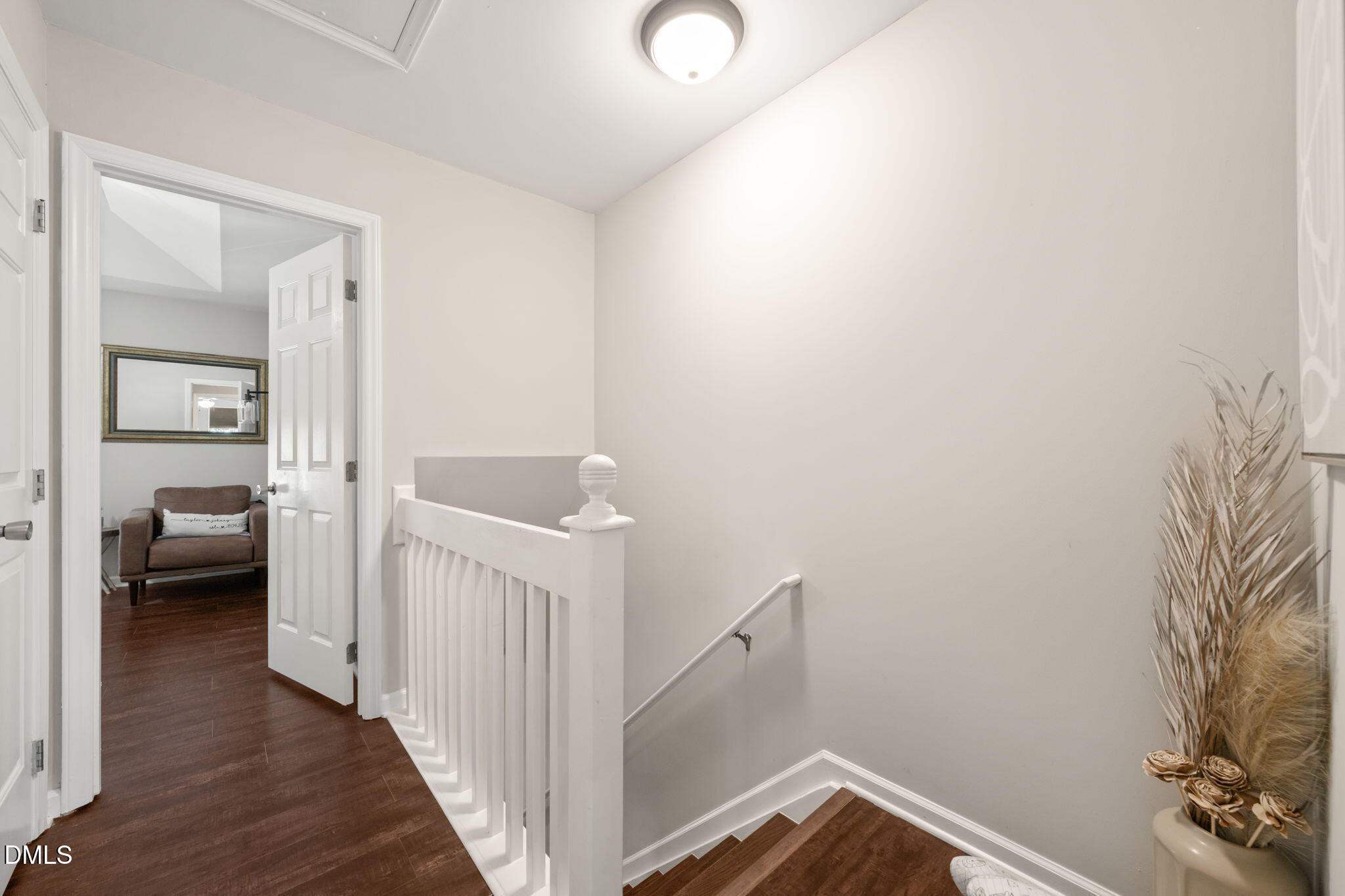 4323 Pine Springs Court Raleigh, NC 27613 - Photo 24 of 38 a view of a hallway with wooden floor and entryway