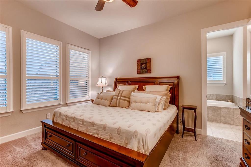 3124 Pablo Way Round Rock, TX 78665 - Photo 14 of 25 a bedroom with a bed and a night stand