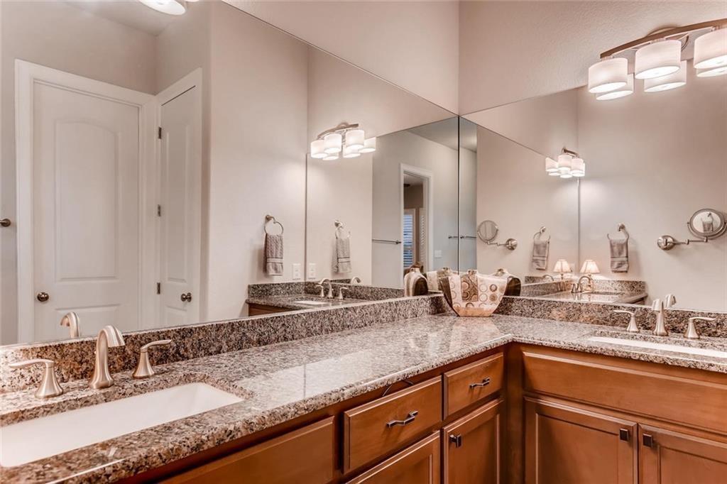 3124 Pablo Way Round Rock, TX 78665 - Photo 17 of 25 a bathroom with a granite countertop sink and a mirror