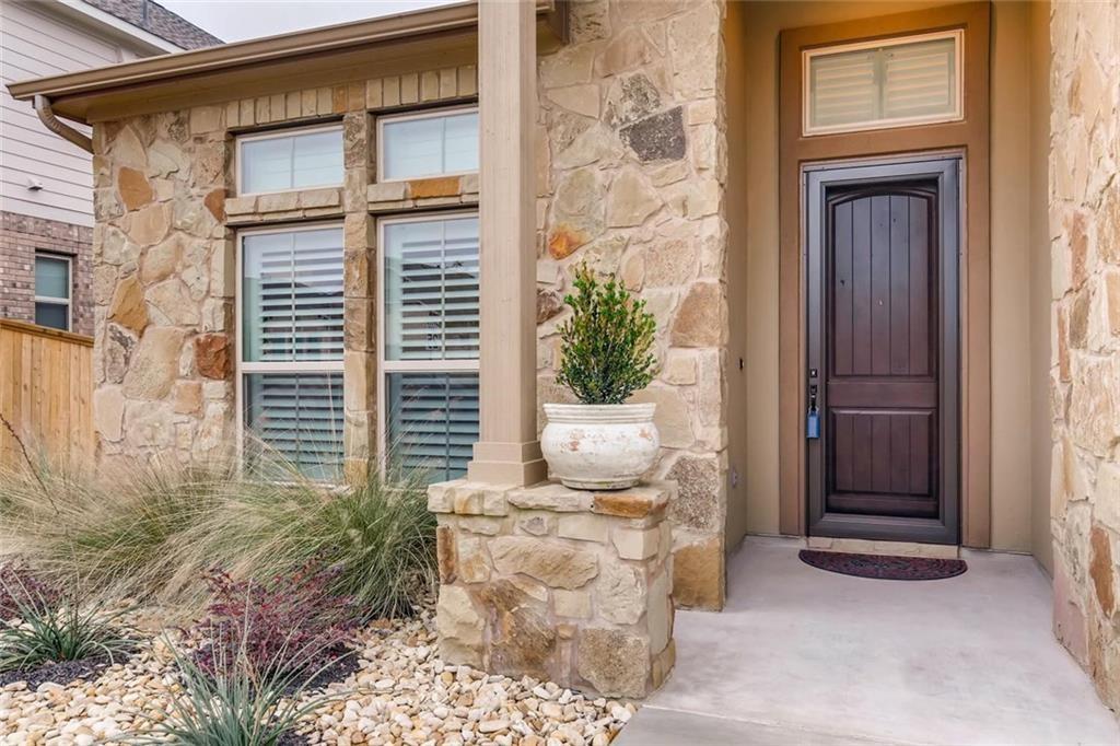 3124 Pablo Way Round Rock, TX 78665 - Photo 3 of 25 a front view of a house with a yard