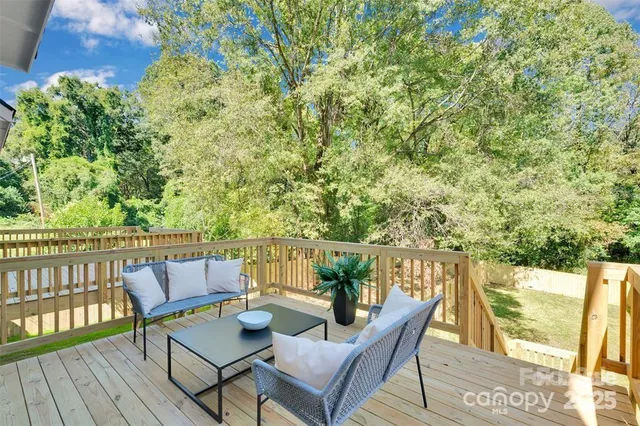 a view of a balcony with chairs
