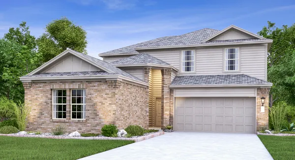 a front view of a house with a garden and garage